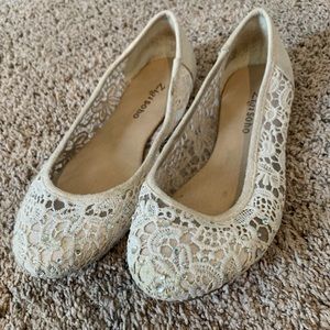 White flats with rhinestones